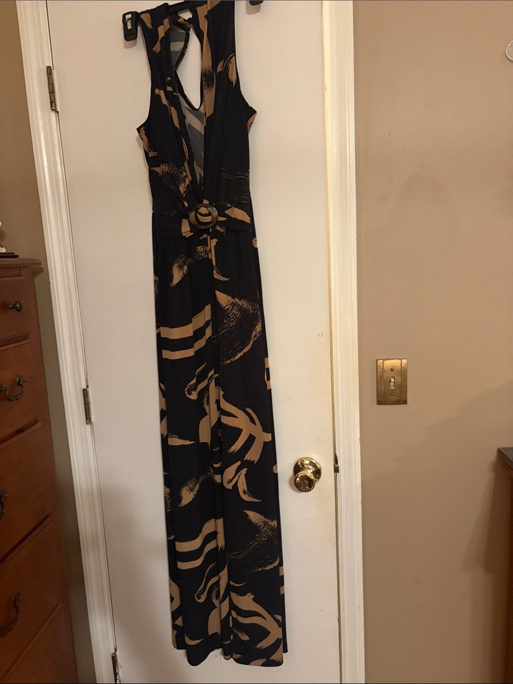 Sleeveless Black and Tan Patterned Jumpsuit